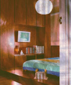 Home Storage Ideas: Built-in bedroom wardrobe nook fits plasma TV, display area and writing desk which slides view when unused