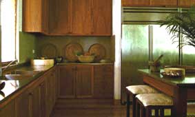 Consistent mix of wood and steel in the ample kitchen cabinets