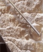 Rough Stone Wall Constrasts with Smooth Steel Handle
